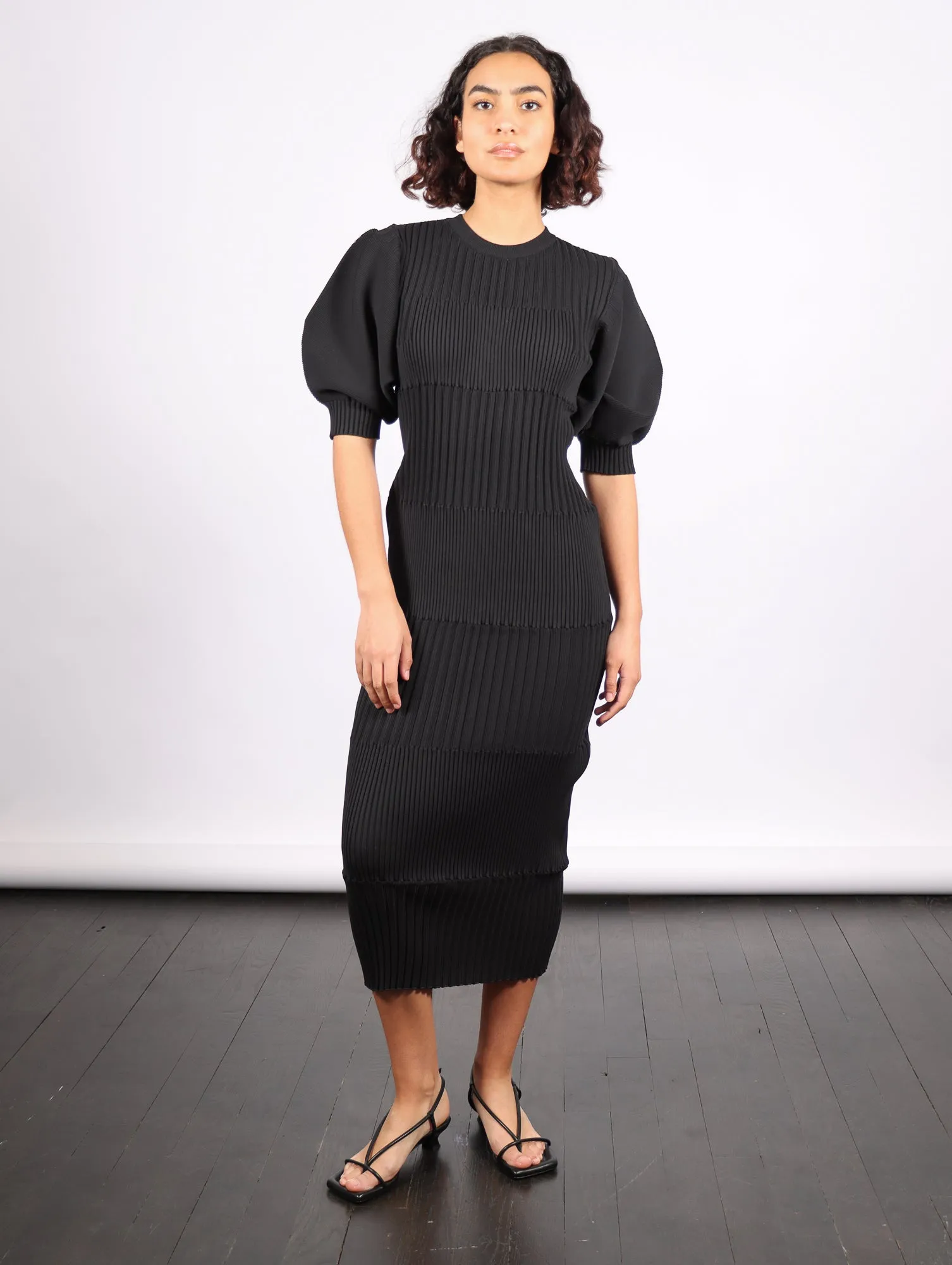 Fluted Short Puff Sleeve Dress in Black by CFCL