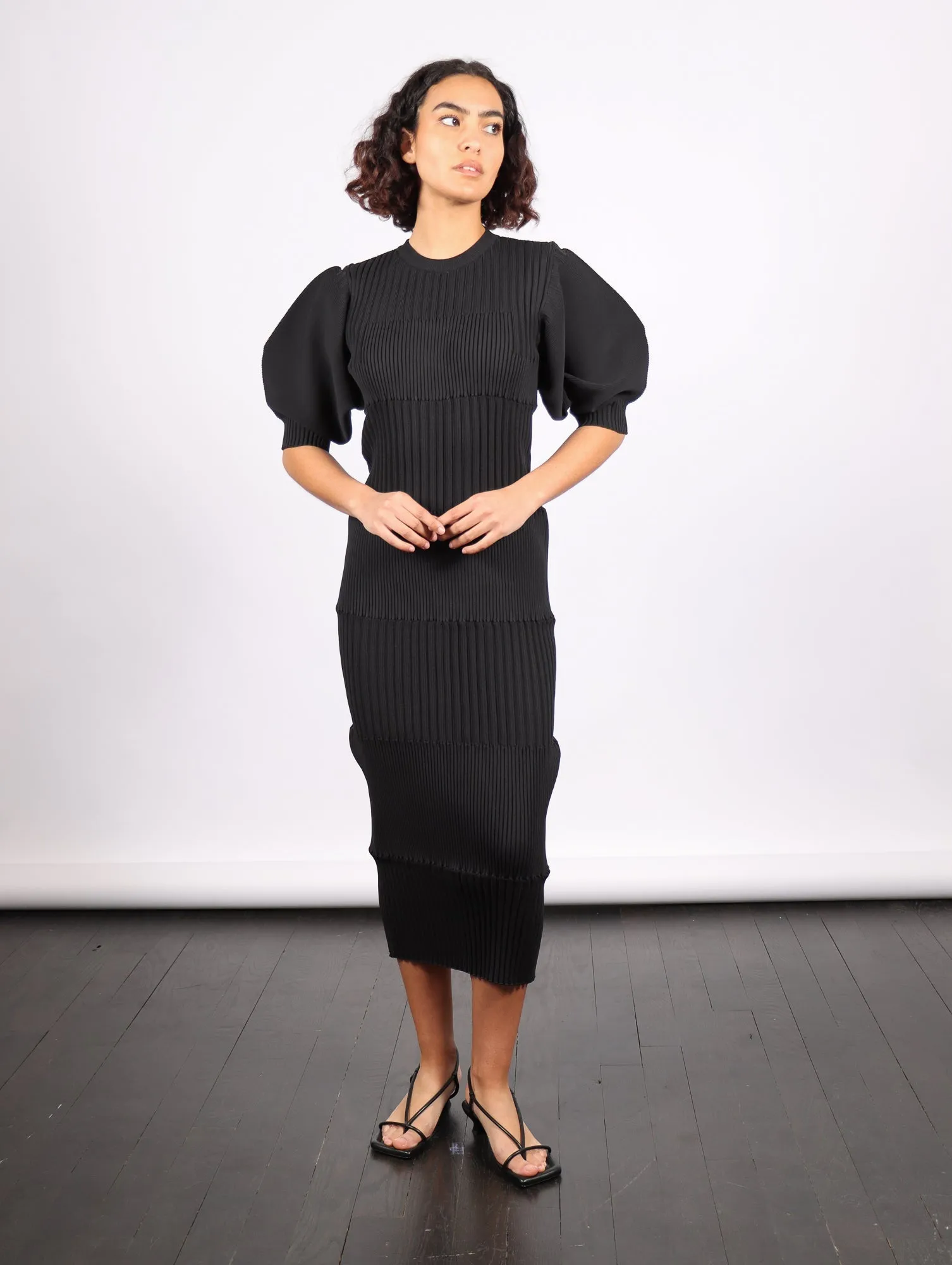 Fluted Short Puff Sleeve Dress in Black by CFCL