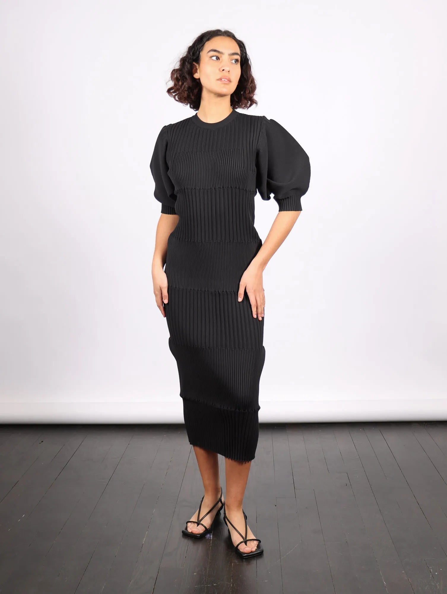 Fluted Short Puff Sleeve Dress in Black by CFCL