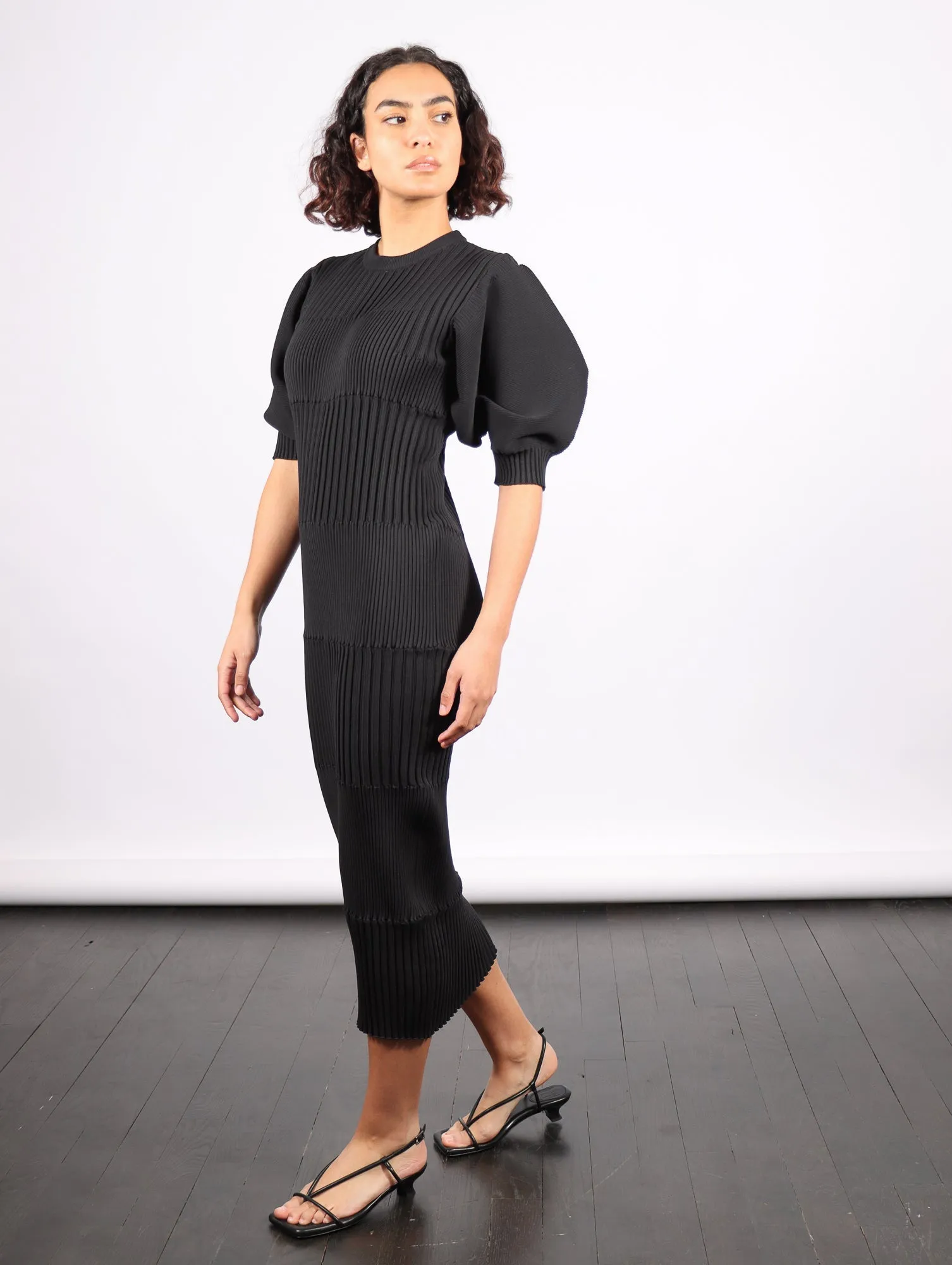 Fluted Short Puff Sleeve Dress in Black by CFCL