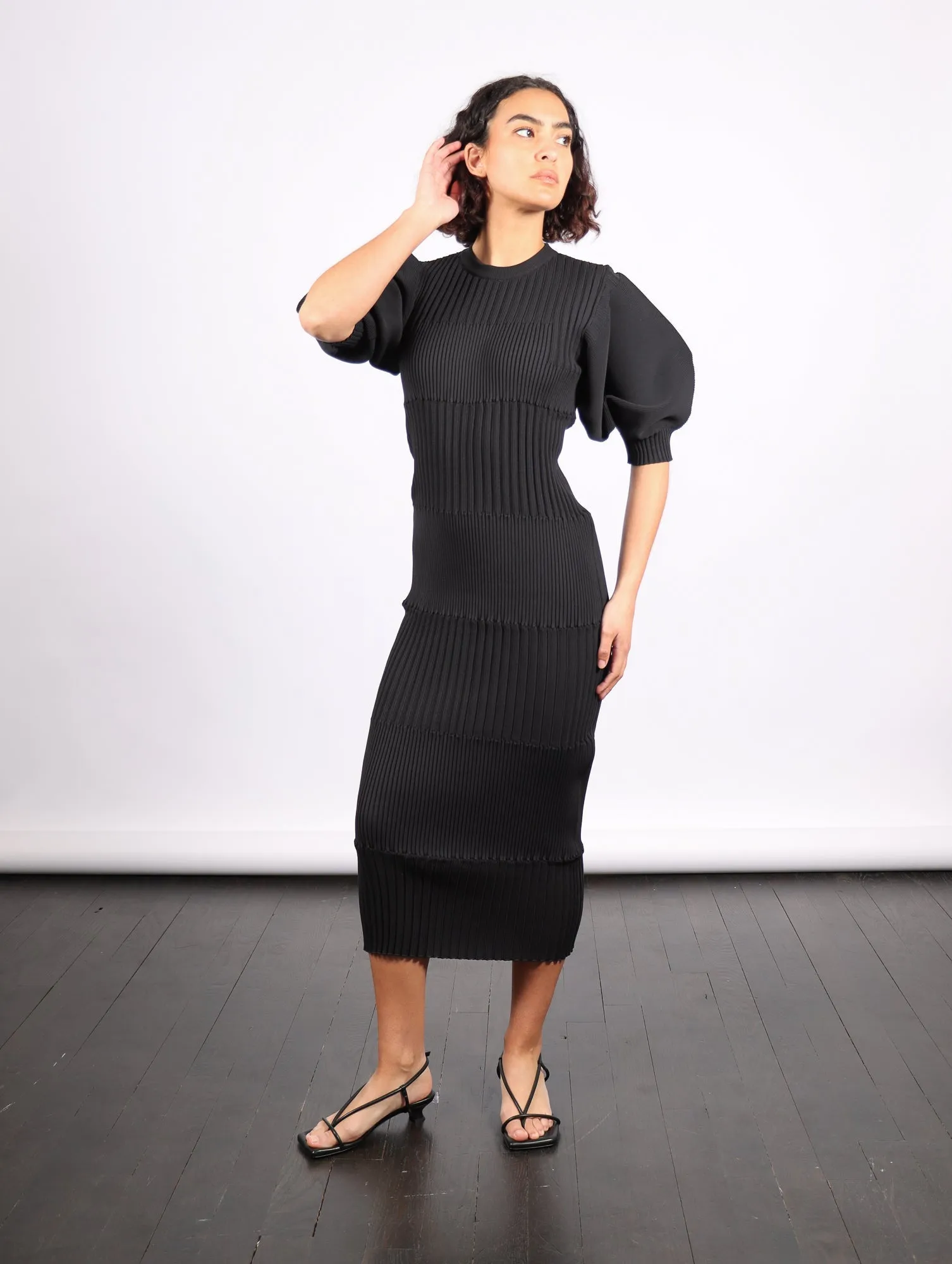 Fluted Short Puff Sleeve Dress in Black by CFCL